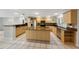 Bright kitchen with granite countertops and stainless steel appliances at 605 Citrus Ct, Largo, FL 33770