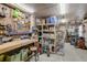 Well organized garage workshop with tools, workbench, and storage shelves at 611 Shore E Dr, Oldsmar, FL 34677