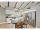 Modern kitchen featuring an island with bar seating, stainless appliances, and ample counter space at 611 Shore E Dr, Oldsmar, FL 34677