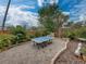 Outdoor patio features a ping pong table surrounded by lush landscaping at 6202 7Th S Ave, Gulfport, FL 33707