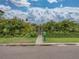 Charming home with a lush front yard and a private gated entrance at 6202 7Th S Ave, Gulfport, FL 33707