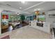 Bright and airy living space with an open layout, seamlessly connecting the living room and kitchen at 6202 7Th S Ave, Gulfport, FL 33707
