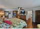 Large primary bedroom with hardwood flooring, walk in closet, ensuite bathroom and an abundance of space at 6202 7Th S Ave, Gulfport, FL 33707