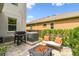 Outdoor patio with grill and seating area at 6214 Windship Ct, Tampa, FL 33647