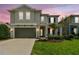 Charming two-story home with a well-manicured lawn and inviting curb appeal at 6214 Windship Ct, Tampa, FL 33647