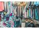 Organized walk-in closet with ample storage and hanging space for clothes, shoes, and accessories at 6635 9Th N Ave, St Petersburg, FL 33710