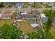 Aerial view of the home's backyard, featuring a covered patio and a variety of outdoor features at 6807 N Himes Ave, Tampa, FL 33614