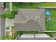 Aerial view of the house showing the roof and surrounding yard at 6961 King Creek Dr, Sun City Center, FL 33573