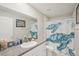 Bathroom with granite counters, white cabinets, and sea turtle shower curtain at 6961 King Creek Dr, Sun City Center, FL 33573