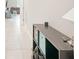Hallway with tile flooring leading to the living room at 6961 King Creek Dr, Sun City Center, FL 33573