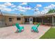 Cozy brick patio with string lights and seating, creating a relaxing outdoor space at 704 Childers Loop, Brandon, FL 33511