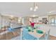 Open-concept living space including the living room, dining space and kitchen at 704 Childers Loop, Brandon, FL 33511