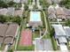 Top-down aerial shot of a community recreational area featuring a pool and sports court at 7611 Wood Violet Dr, Gibsonton, FL 33534