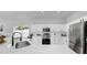 Modern kitchen featuring white cabinets, stainless steel appliances, and stone countertops at 7611 Wood Violet Dr, Gibsonton, FL 33534