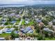 Overhead shot of the neighborhood showing the home's generous lawn and a pool at 7815 16Th Nw Ave, Bradenton, FL 34209