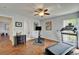 Relaxing workout area features hardwood floors and a ceiling fan for comfortable, convenient exercise sessions at 7815 16Th Nw Ave, Bradenton, FL 34209