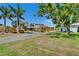 Beautiful property with mature trees, green grass and stone accents at 7815 16Th Nw Ave, Bradenton, FL 34209