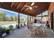 Enclosed lanai featuring a dining area and views of the backyard at 7815 16Th Nw Ave, Bradenton, FL 34209
