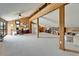 Spacious living room featuring wood paneling, a fireplace, and an open floor plan at 7815 16Th Nw Ave, Bradenton, FL 34209