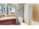 Cozy, well-lit bathroom offering toilet and shower combination at 8111 Brickleton Woods Ave, Gibsonton, FL 33534