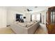 Well-lit living room offering comfortable seating and TV entertainment at 8111 Brickleton Woods Ave, Gibsonton, FL 33534