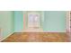 Inviting foyer with tiled floors, coat closet, and a welcoming entryway to the home at 8619 Gold Pine Dr, Port Richey, FL 34668