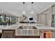 Close-up view of kitchen island featuring a stainless steel sink at 9136 Warm Springs Cir, Parrish, FL 34219