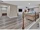 Open-concept living space with a custom built in play area and spacious lounge area with views from the 2nd floor at 9136 Warm Springs Cir, Parrish, FL 34219