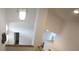 Bright hallway with a unique light fixture and an open, airy feel at 10402 Ashley Oaks Drive, Riverview, FL 33578