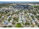 High-angle view of a community boasting a mix of housing, mature trees, and well-planned streetscapes at 12359 82Nd N Ave, Seminole, FL 33772