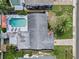 This aerial view showcases a private pool, patio, and a spacious backyard oasis perfect for entertaining and relaxation at 12359 82Nd N Ave, Seminole, FL 33772