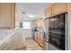 Updated kitchen with stainless steel appliances, granite countertops, and ample cabinet space at 12359 82Nd N Ave, Seminole, FL 33772