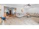 Inviting living room with wood floors, neutral decor, and an open layout that is great for entertaining and relaxation at 12359 82Nd N Ave, Seminole, FL 33772