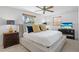 Comfortable bedroom with large windows, neutral tones, and modern furnishings at 12359 82Nd N Ave, Seminole, FL 33772