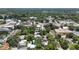 Expansive aerial view showcasing property location surrounded by lush greenery and convenient city access at 125 Picardy Villa Cir # 100, Brandon, FL 33510