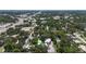 This aerial view highlights property and surrounding area featuring convenient city access and lush scenery at 125 Picardy Villa Cir # 100, Brandon, FL 33510