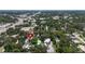 This aerial view shows lush surroundings with the location marked by a red pin for easy identification at 125 Picardy Villa Cir # 100, Brandon, FL 33510