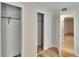 This bedroom features wood floors and a closet at 125 Picardy Villa Cir # 100, Brandon, FL 33510
