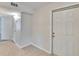 A view of the entryway with tile flooring and a front door at 125 Picardy Villa Cir # 100, Brandon, FL 33510