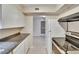 View of kitchen featuring stainless steel appliances and tile flooring at 125 Picardy Villa Cir # 100, Brandon, FL 33510