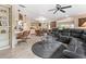 Open-concept living area with comfortable seating, an eating area, and seamless flow to the kitchen at 12501 Ulmerton Rd # 110, Largo, FL 33774