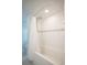 Bathroom with tub/shower combination featuring subway tile and a decorative accent at 13296 88Th N Ave, Seminole, FL 33776