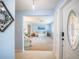Cozy living room with pale blue walls, hardwood floors, and comfortable seating at 13296 88Th N Ave, Seminole, FL 33776