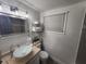Stylish bathroom with a unique vessel sink and modern fixtures and decor at 1335 Waikiki Way, Tampa, FL 33619