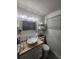 Cozy bathroom featuring a modern glass bowl sink and marble countertop at 1335 Waikiki Way, Tampa, FL 33619