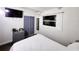 Comfortable bedroom with a cozy bed, dresser, and window view at 1335 Waikiki Way, Tampa, FL 33619