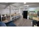 Spacious kitchen features pistachio-colored cabinets, stainless steel appliances, and an open concept living area at 1335 Waikiki Way, Tampa, FL 33619