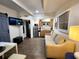 Cozy living space with a kitchenette and comfortable furnishings at 1335 Waikiki Way, Tampa, FL 33619