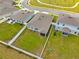 Aerial shot of the property with fenced yard, nice landscaping and views of the neighborhood at 14532 Whitewater Way, Brooksville, FL 34604