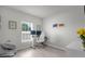 Bright office space with natural light, light wood floors, and modern furnishings at 14532 Whitewater Way, Brooksville, FL 34604